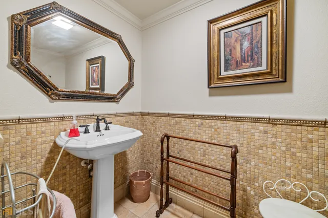 an aerial view of a house with outdoor space and street view