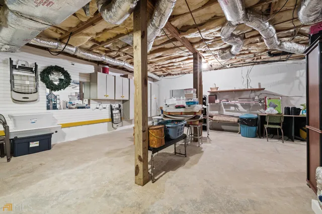 an aerial view of a house with outdoor space and street view