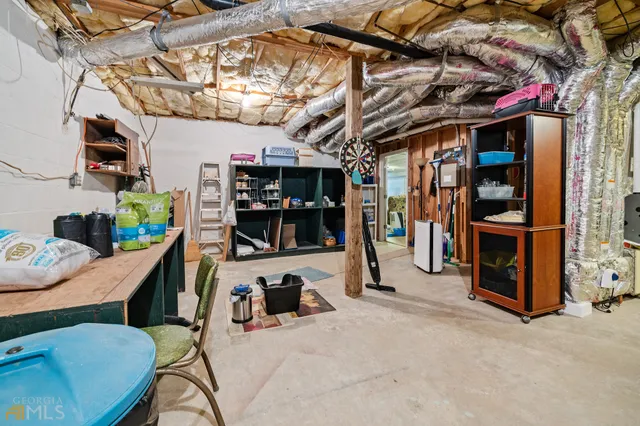 an aerial view of a house with outdoor space and street view