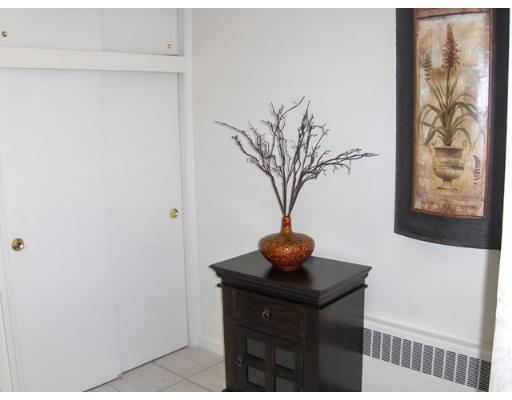 23 Tyler Road Lexington, MA 02420 - Photo 6 of 10 a vase of flowers sitting on a table