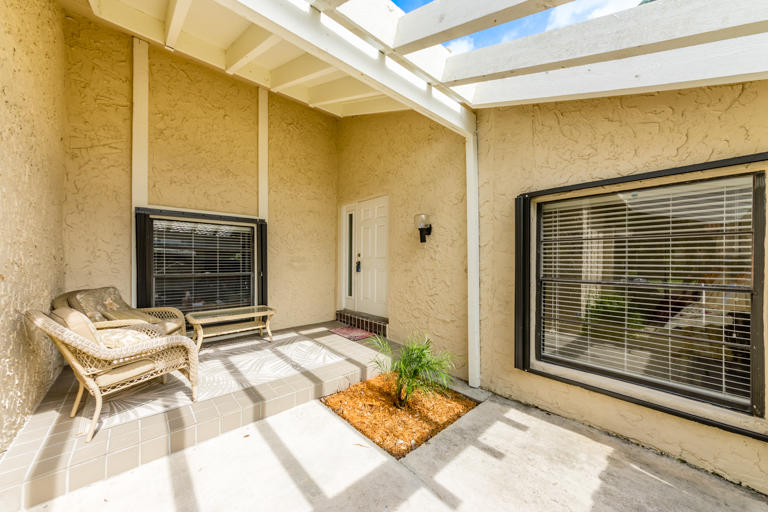 6356 Pond Apple Road Boca Raton, FL 33433 - Photo 3 of 26 6356 Pond Apple Front Patio