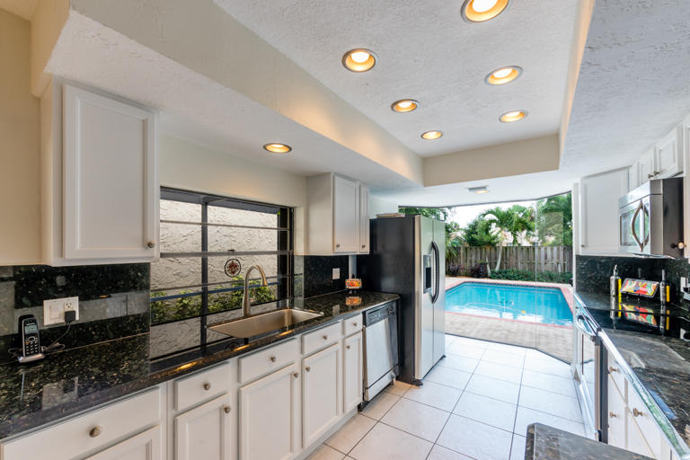 6356 Pond Apple Road Boca Raton, FL 33433 - Photo 10 of 26 6356 Pond Apple Kitchen 2