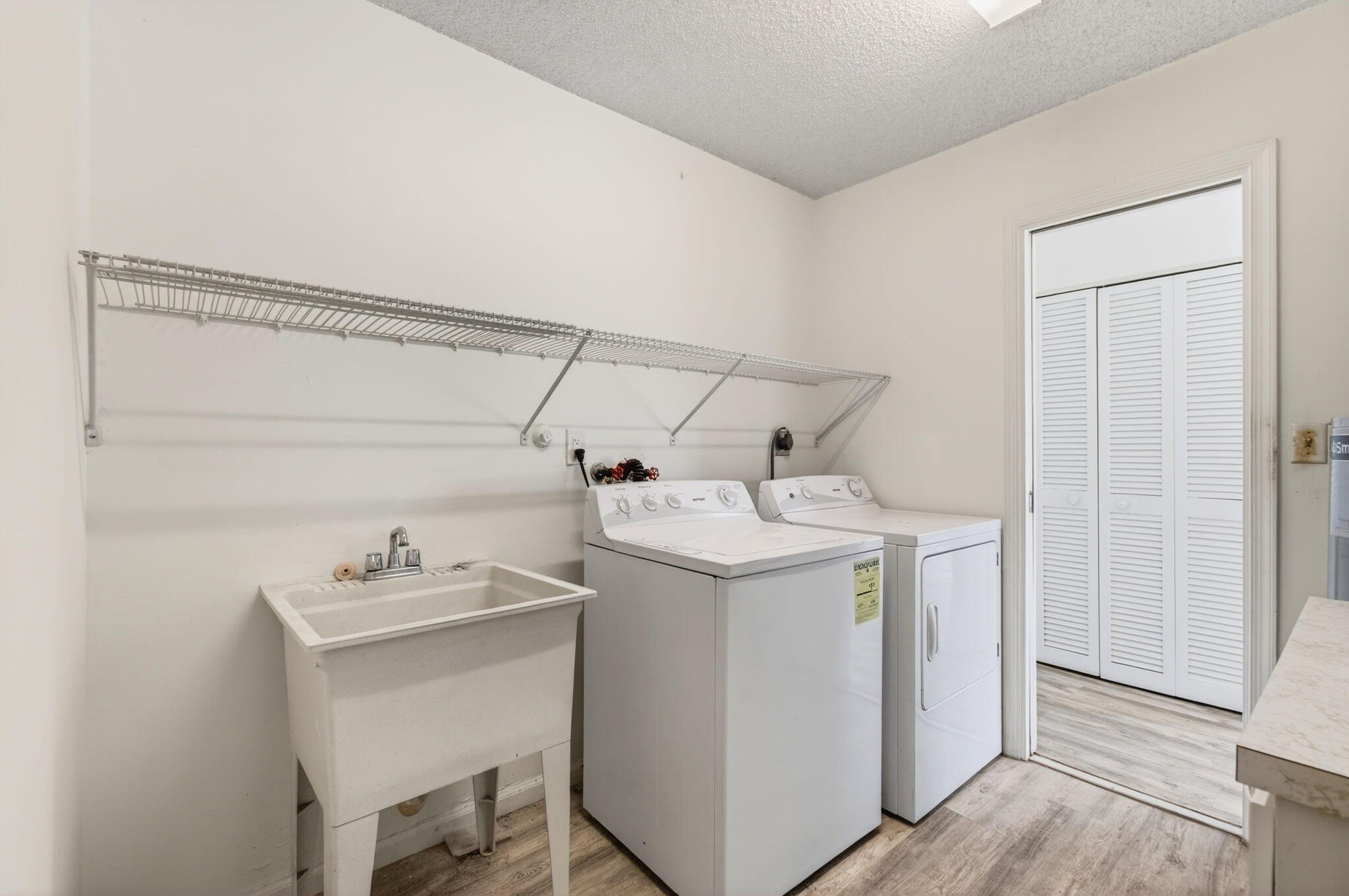 6063 Golf Vista Way Boca Raton, FL 33433 - Photo 38 of 52 a utility room with dryer and washer