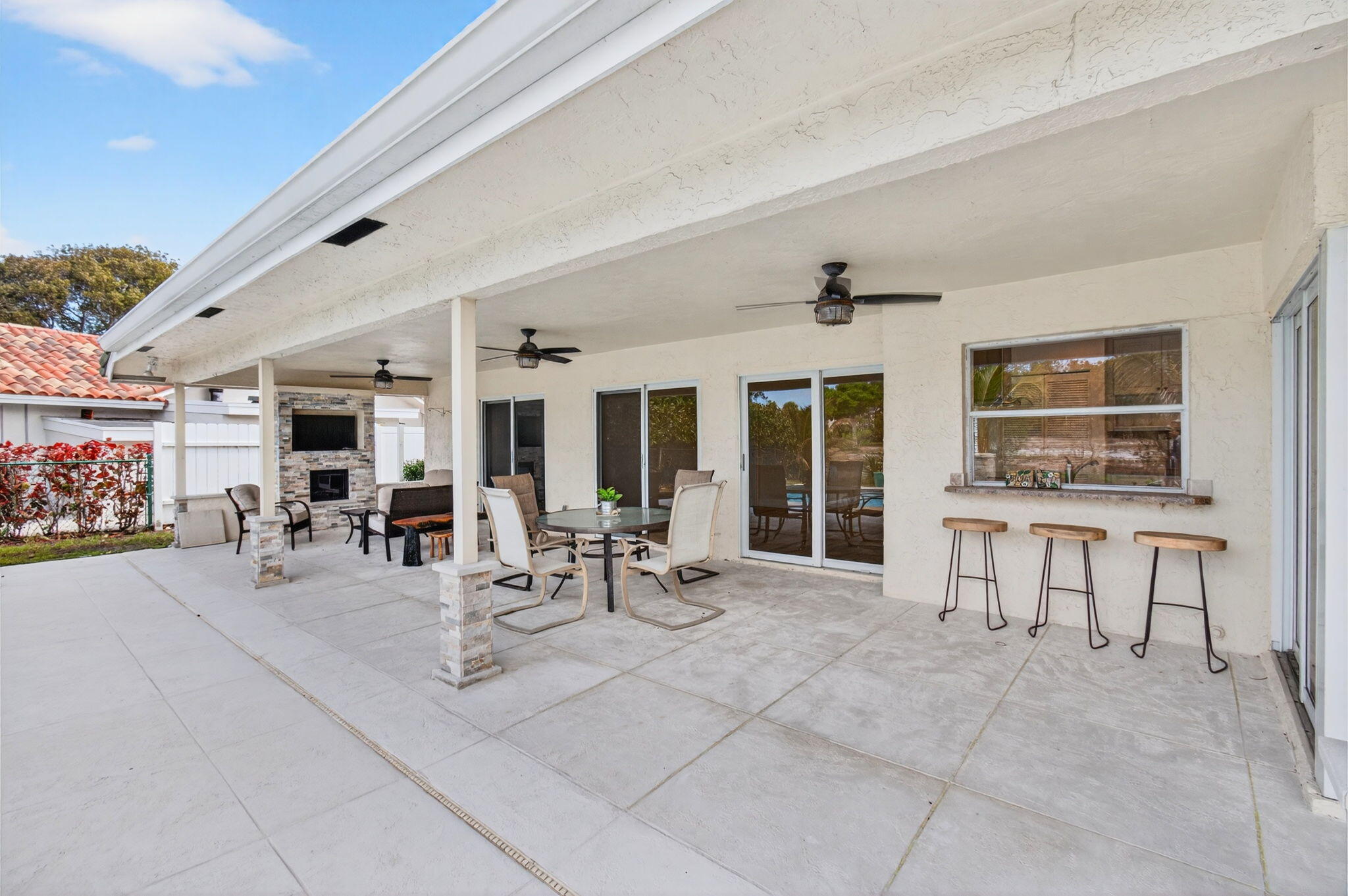 6063 Golf Vista Way Boca Raton, FL 33433 - Photo 39 of 52 a view of a lobby with furniture and floor to ceiling window