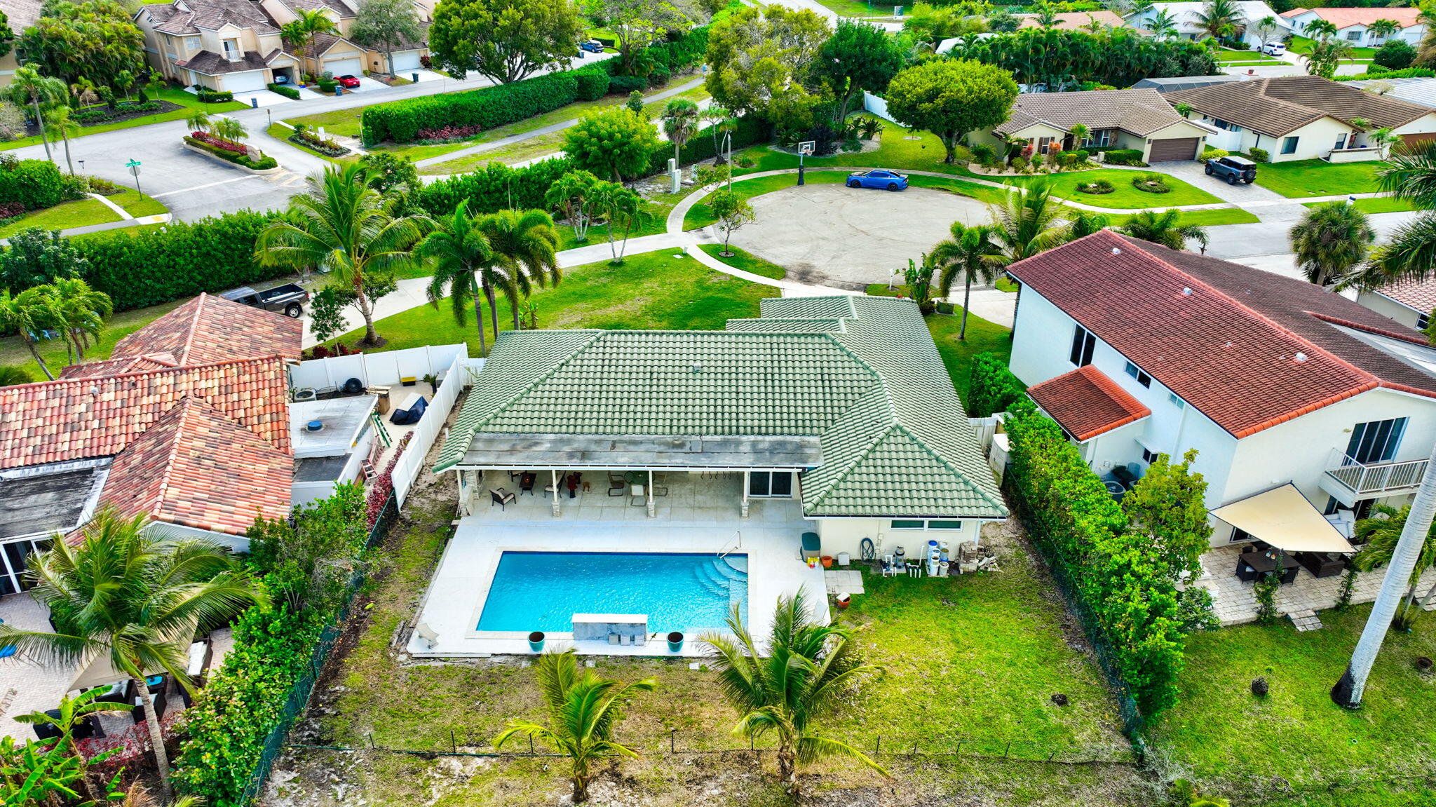 6063 Golf Vista Way Boca Raton, FL 33433 - Photo 47 of 52 an aerial view of residential houses with outdoor space and street view