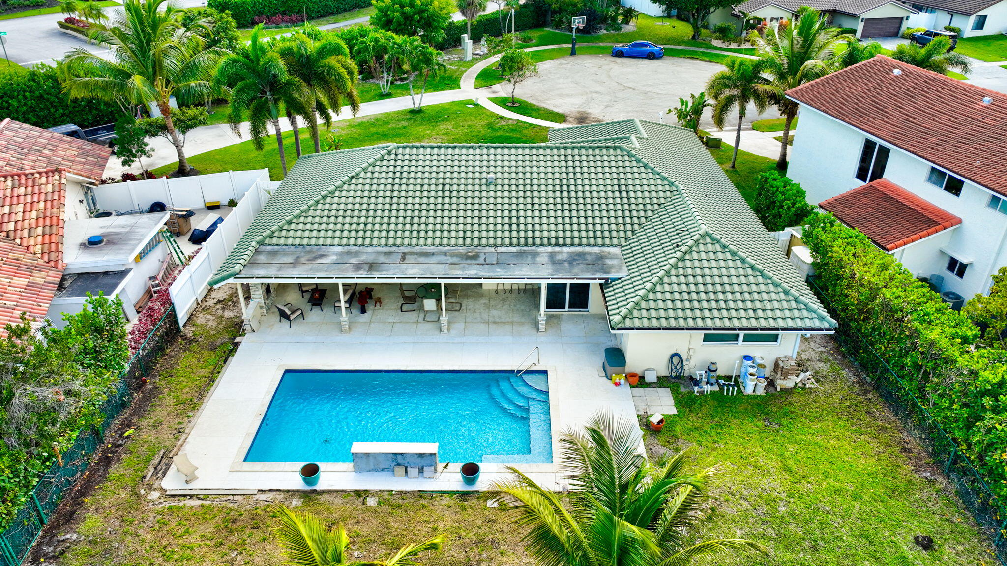6063 Golf Vista Way Boca Raton, FL 33433 - Photo 49 of 52 an aerial view of a house with swimming pool and patio
