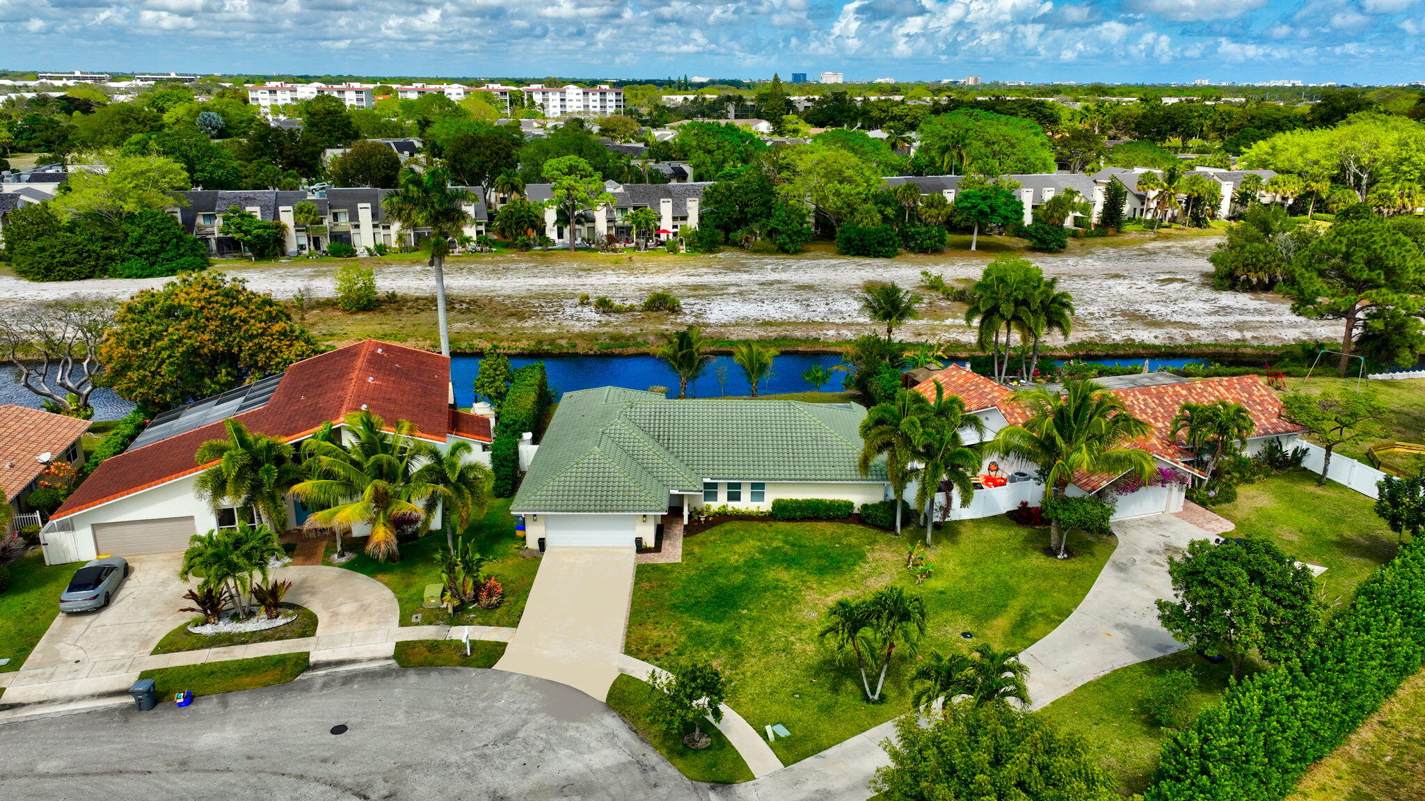 6063 Golf Vista Way Boca Raton, FL 33433 - Photo 50 of 52 an aerial view of a house with a yard basket ball court and outdoor seating