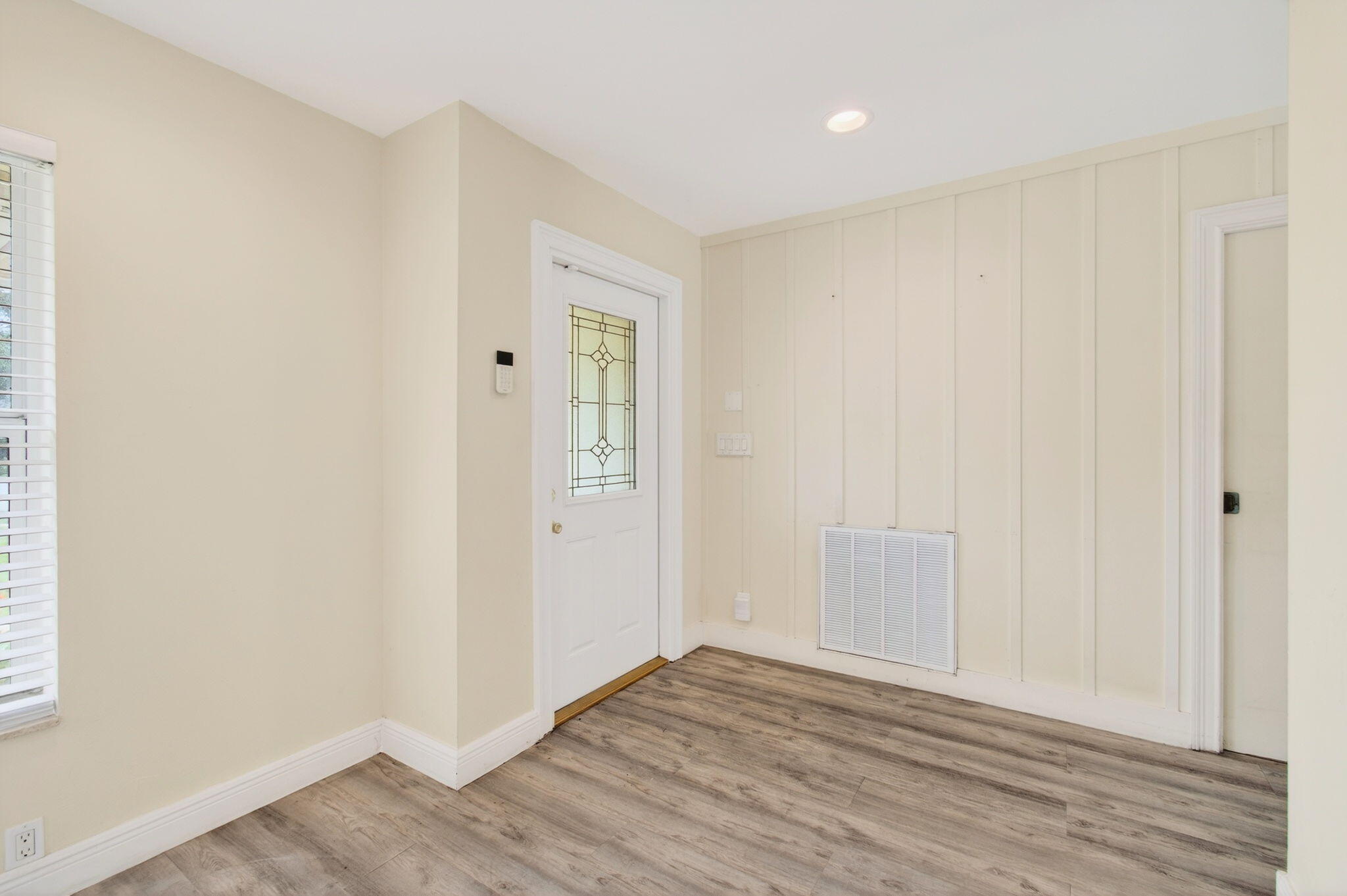6063 Golf Vista Way Boca Raton, FL 33433 - Photo 5 of 52 a view of an empty room with wooden floor