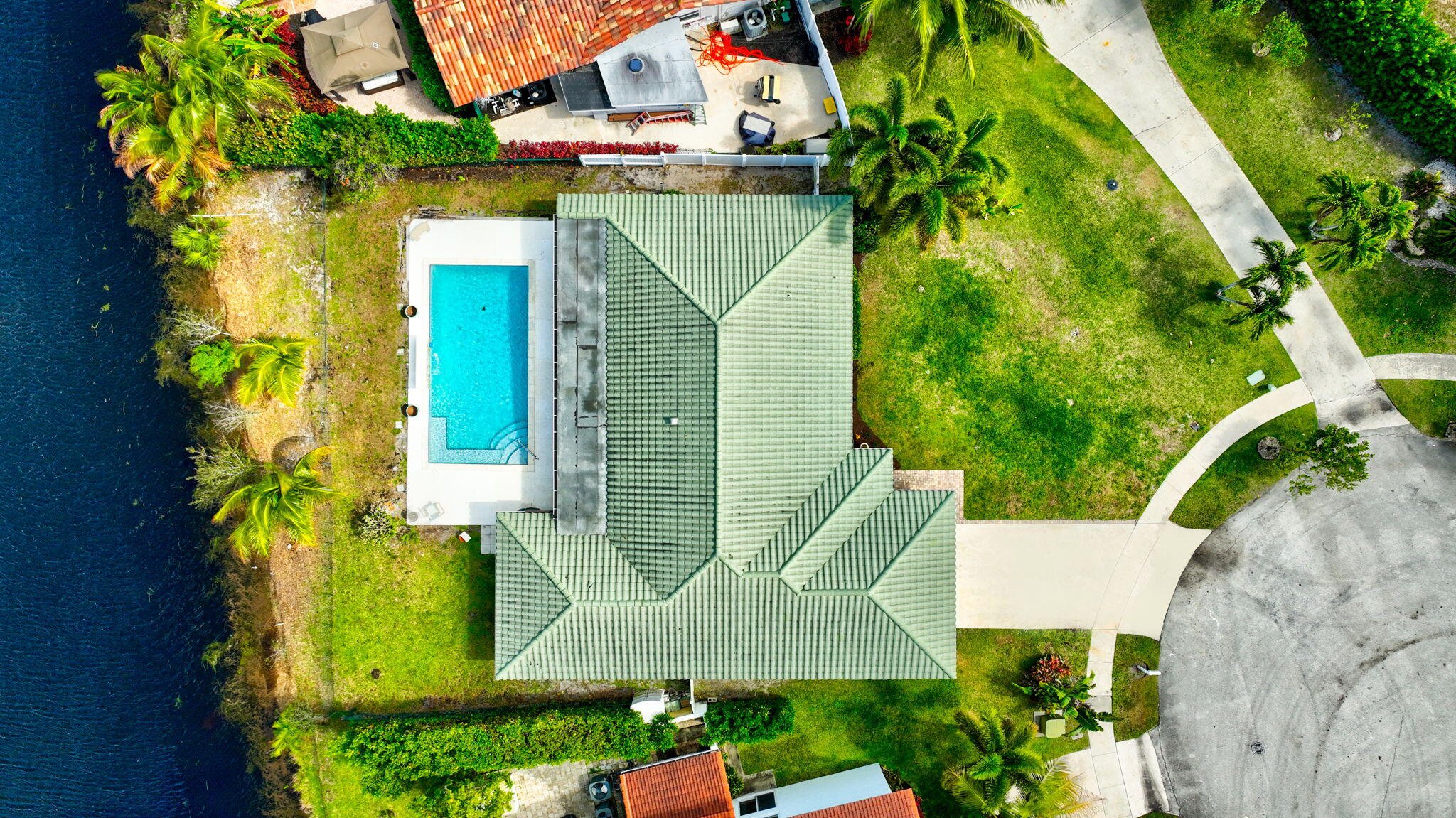 6063 Golf Vista Way Boca Raton, FL 33433 - Photo 51 of 52 an aerial view of a house with swimming pool and garden