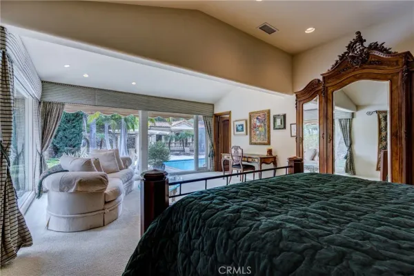 a large white kitchen with a large window