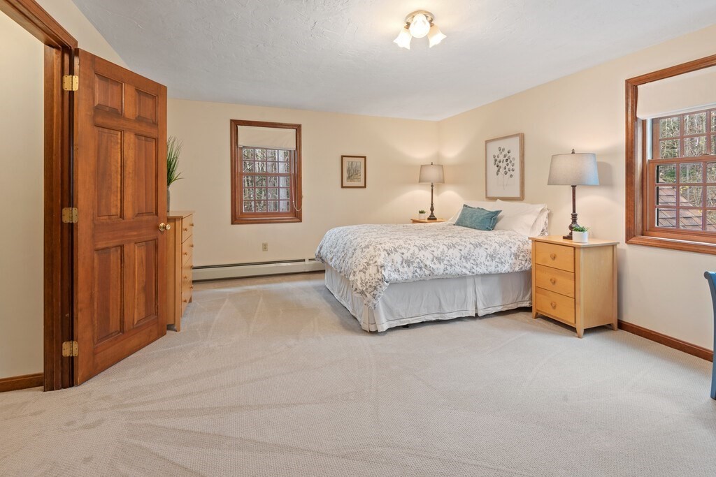532 B Hubbardston Road Princeton, MA 01541 - Photo 20 of 41 a bedroom with a bed and a cabinets