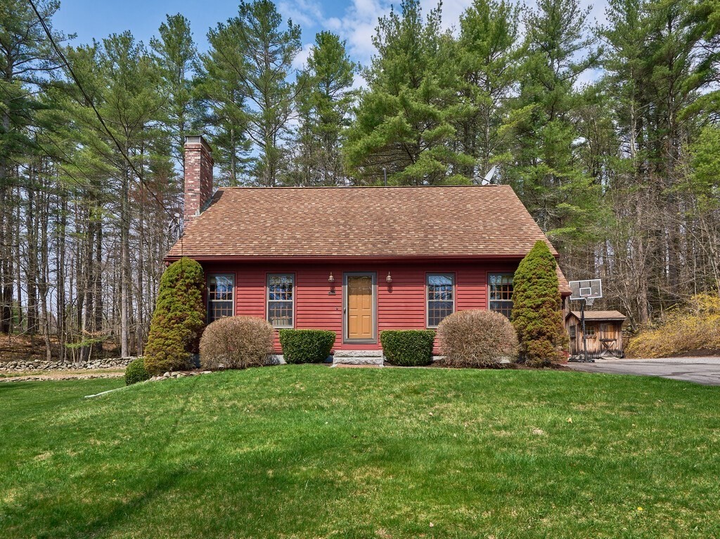 532 B Hubbardston Road Princeton, MA 01541 - Photo 2 of 41 a view of a yard in front of a house with plants and large tree