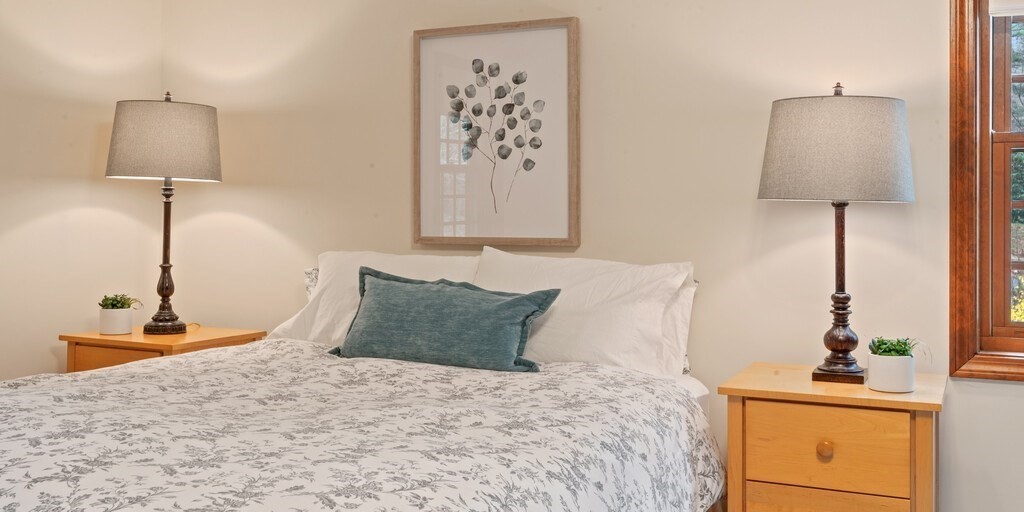 532 B Hubbardston Road Princeton, MA 01541 - Photo 21 of 41 a bedroom with a bed and a lamp