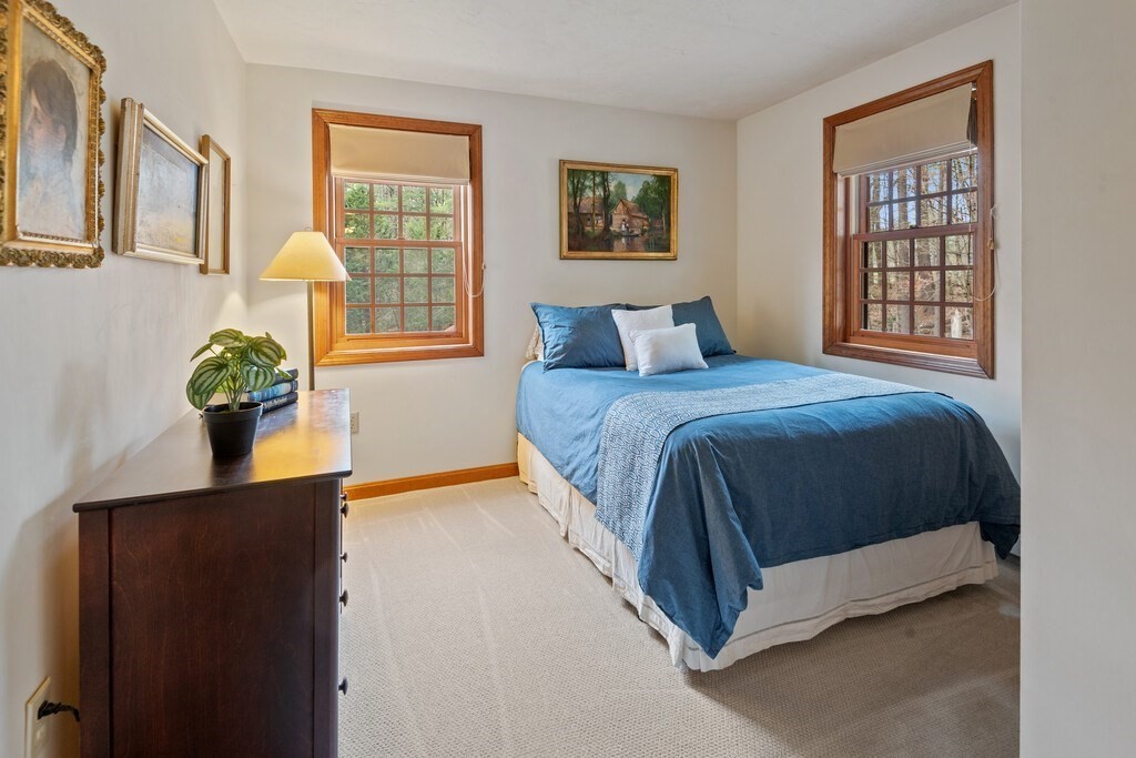 532 B Hubbardston Road Princeton, MA 01541 - Photo 25 of 41 a bedroom with a bed table and window