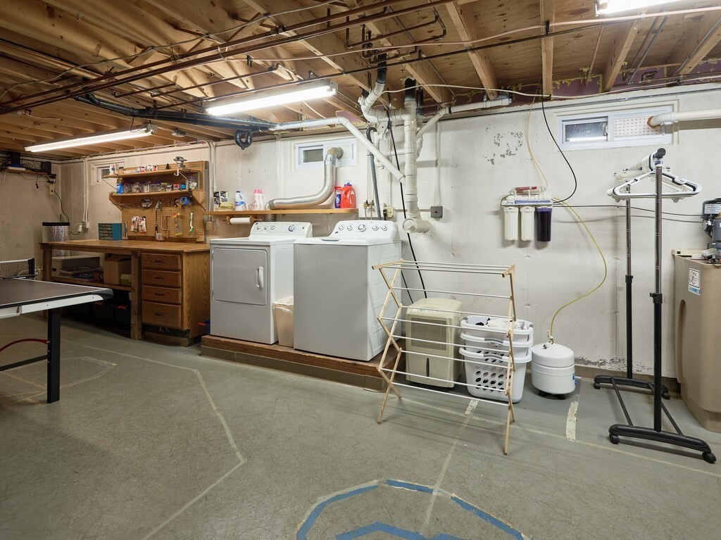 532 B Hubbardston Road Princeton, MA 01541 - Photo 28 of 41 a storage room with water heater and racks