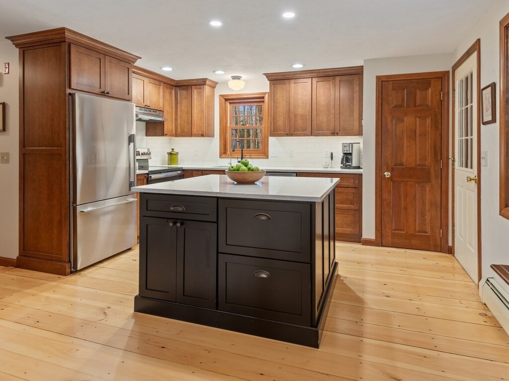 532 B Hubbardston Road Princeton, MA 01541 - Photo 9 of 41 a kitchen with granite countertop a refrigerator and a sink