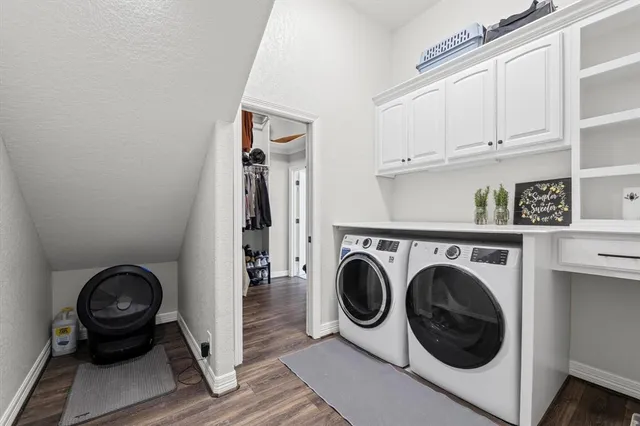 a bedroom with bed and a window