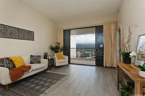 a living room with furniture and a table