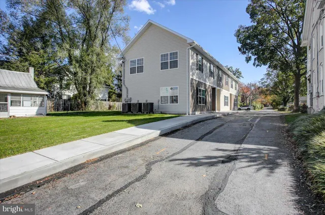 a house with garden in front of it