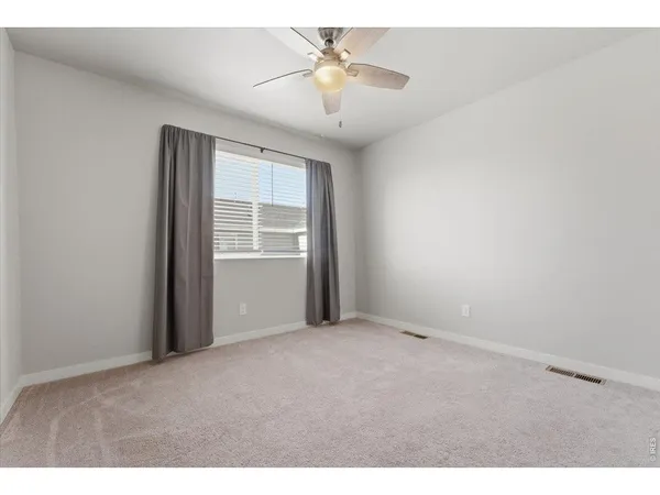 a view of storage and utility room with washer and dryer