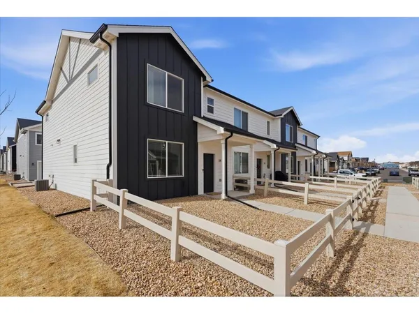 a view of a house with a garage