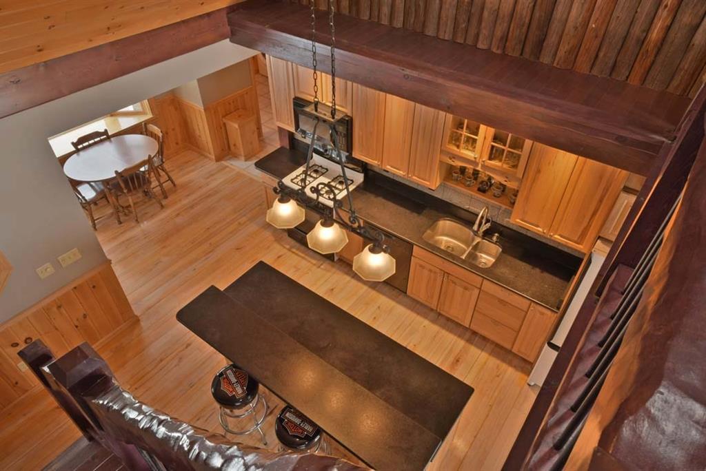 214 North Dexter Road Sangerville, ME 04479 - Photo 11 of 35 Looking down into the kitchen from...