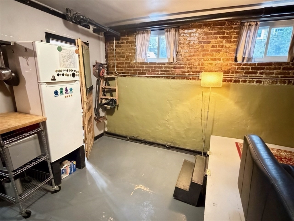 5 Spofford Road, Unit 17 Boston, MA 02134 - Photo 5 of 12 a view of a room with gym equipment