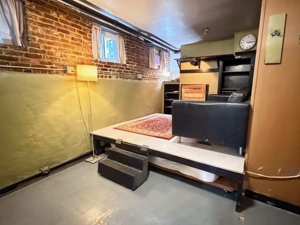 5 Spofford Road, Unit 17 Boston, MA 02134 - Photo 6 of 12 a room with table