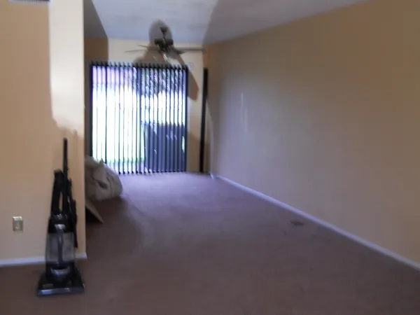 a view of a livingroom with a staircase