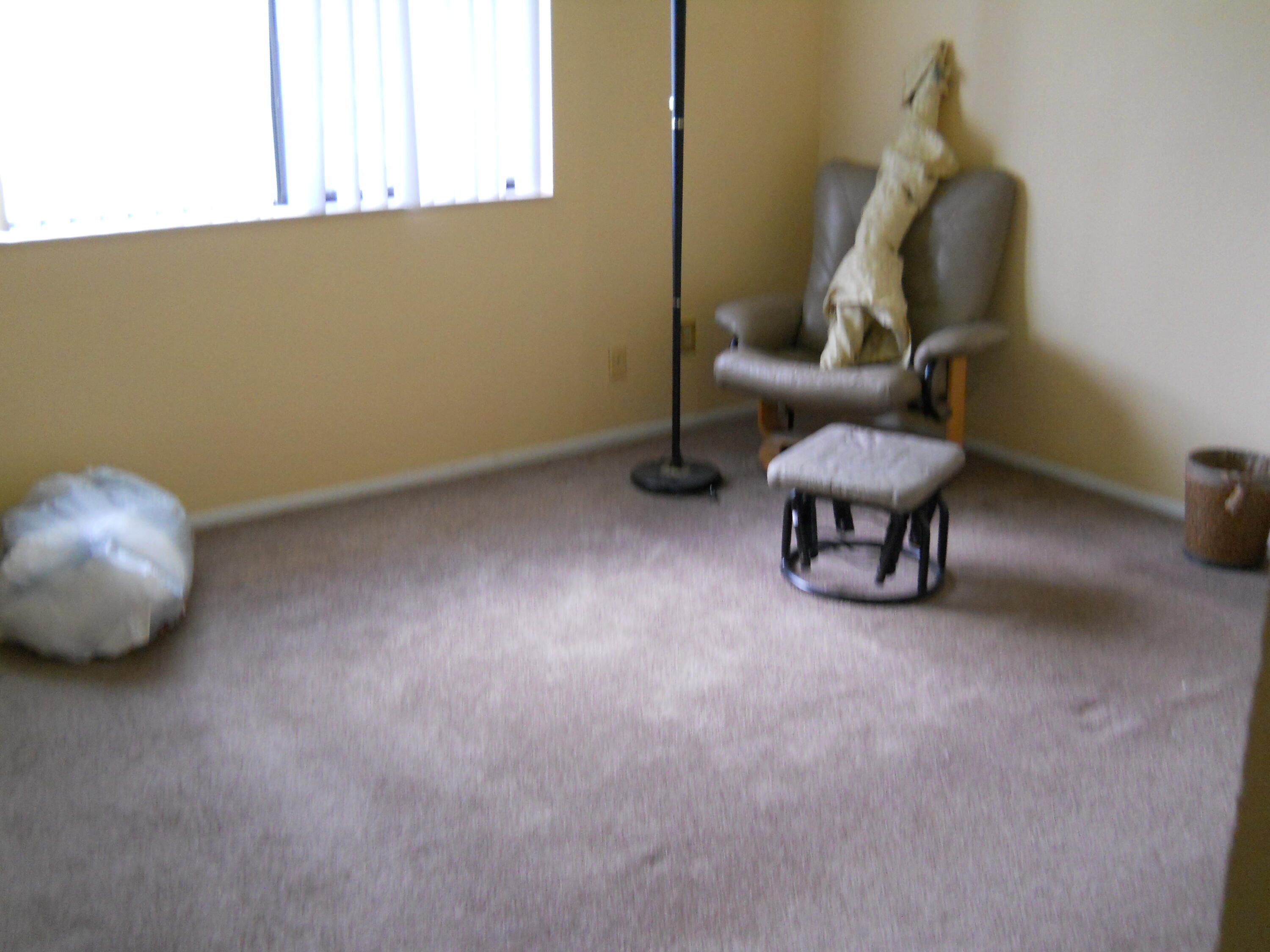 3513 Tree Ridge Lane Northeast Palm Bay, FL 32905 - Photo 14 of 16 a living room with furniture and a window