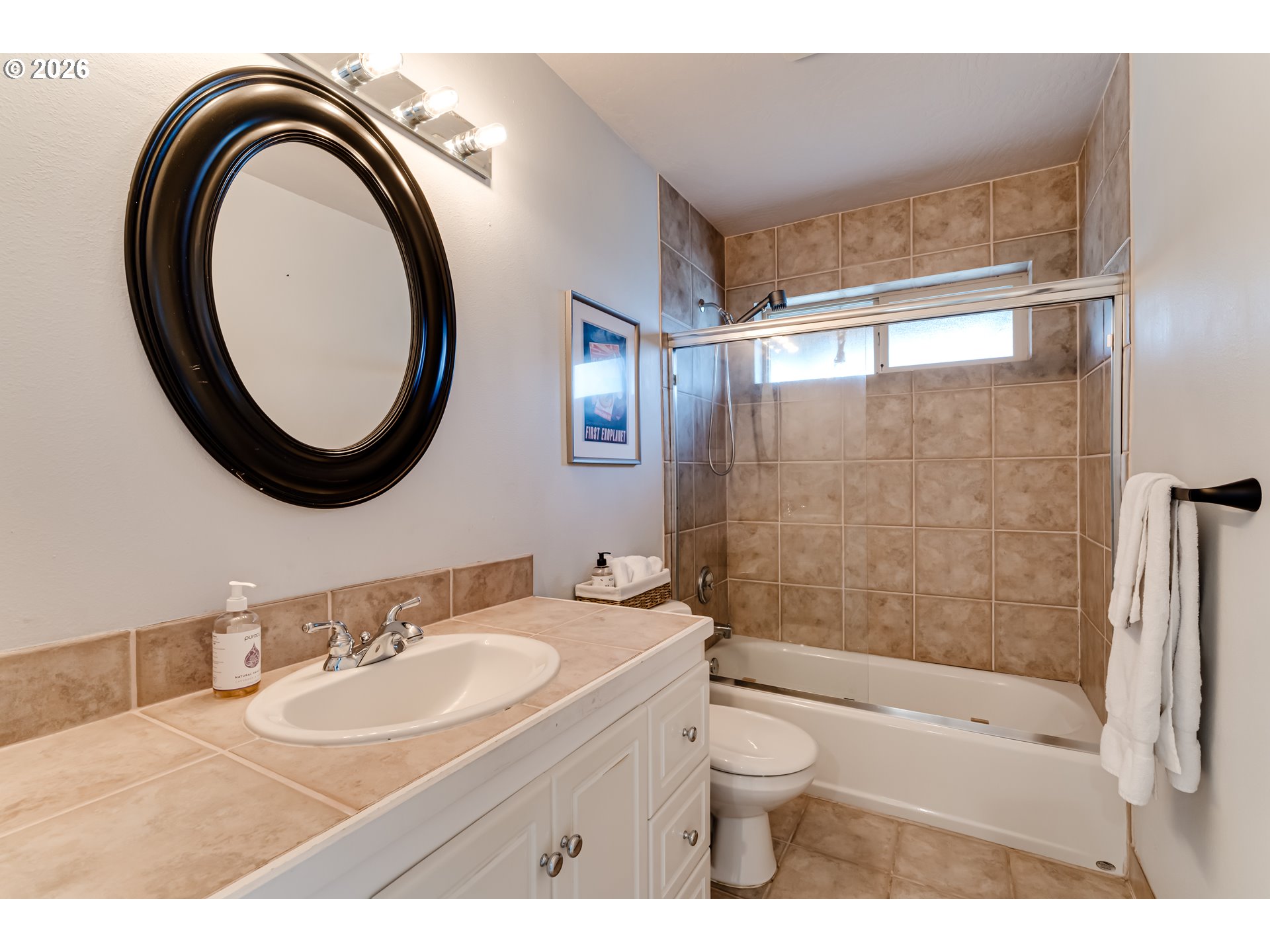 2736 Kismet Way Eugene, OR 97405 - Photo 31 of 48 a bathroom with a sink a toilet and a mirror