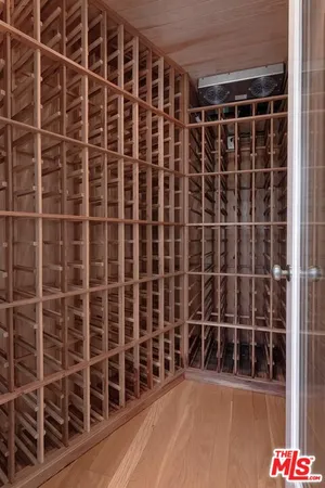 a kitchen with granite countertop a sink stove and refrigerator