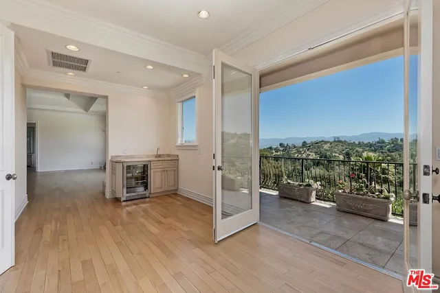 a spacious bathroom with a large tub shower and sink
