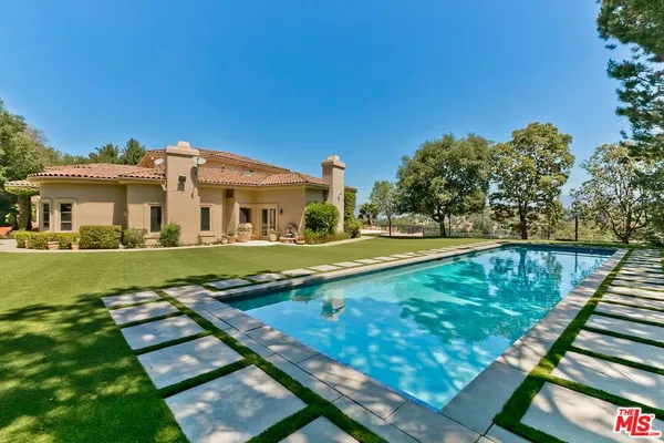 a view of an outdoor space and tennis court