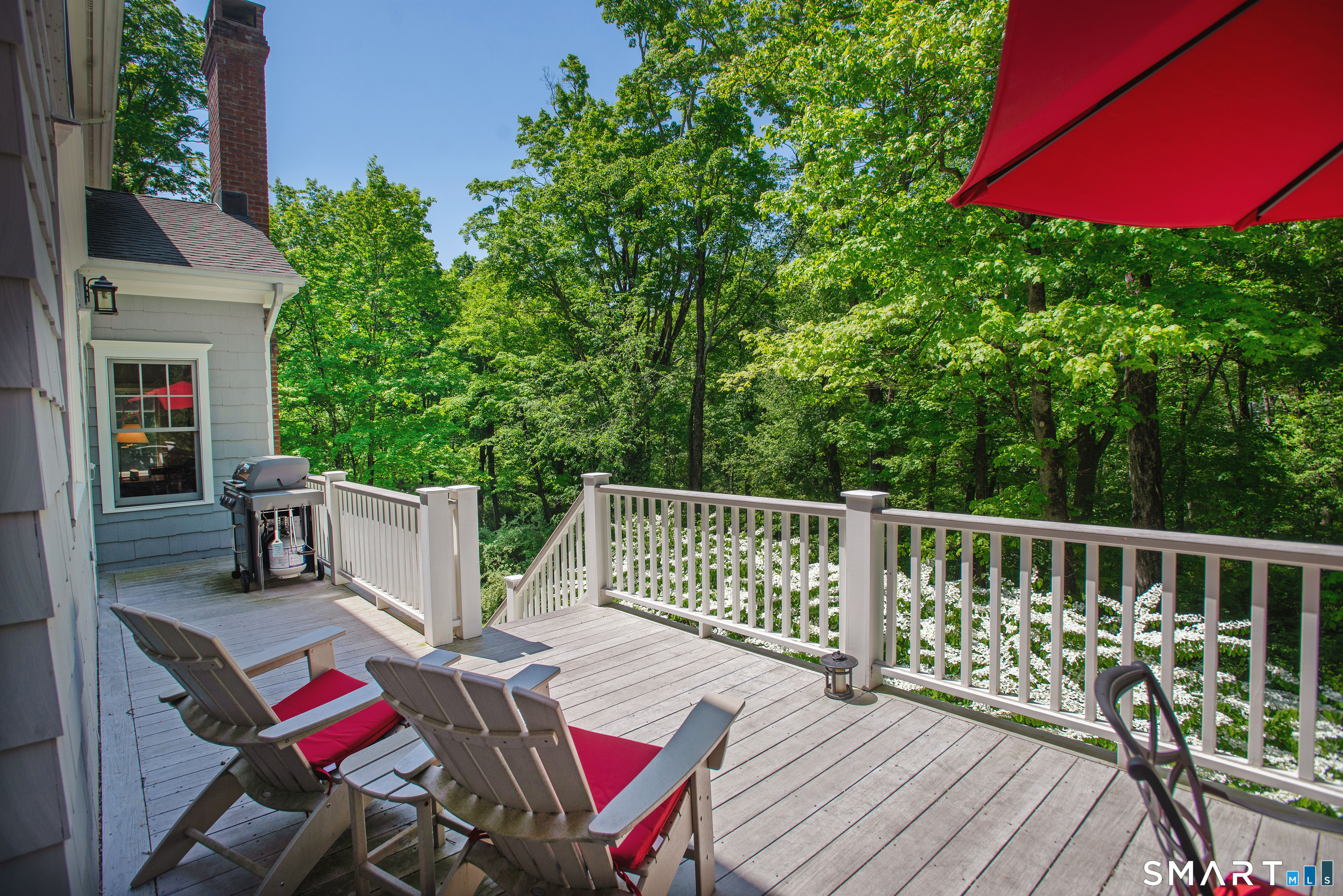 1 Spectacle Lane Ridgefield, CT 06877 - Photo 22 of 31 a view of balcony with wooden floor and outdoor seating