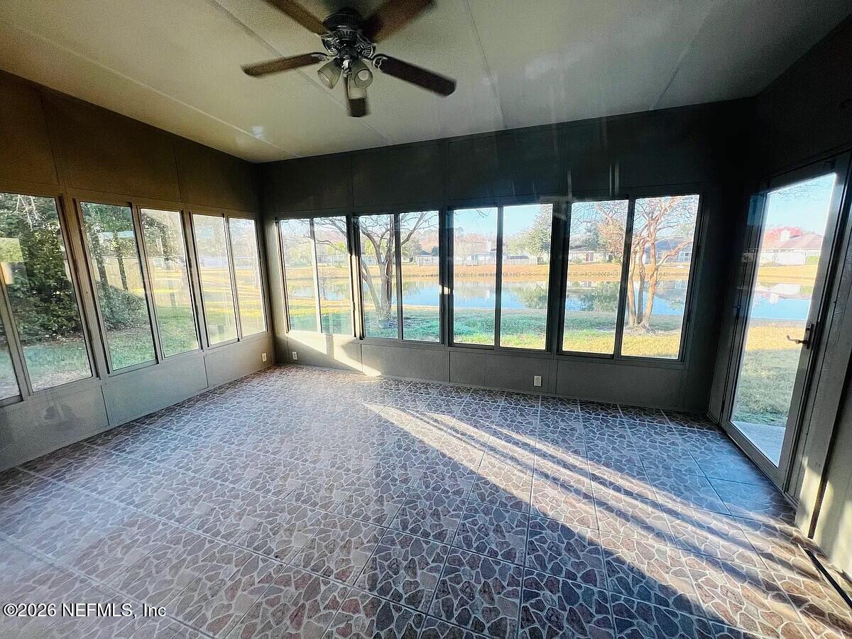 913 Mackinaw Trail St. Augustine, FL 32092 - Photo 59 of 65 a view of an empty room with a balcony