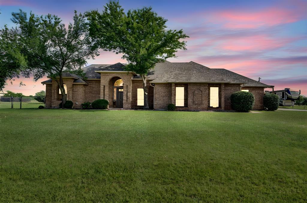 431 Mc Alpin Road Midlothian, TX 76065 - Photo 3 of 18 Brick-clad single-story residence featuring a prominent arched entry