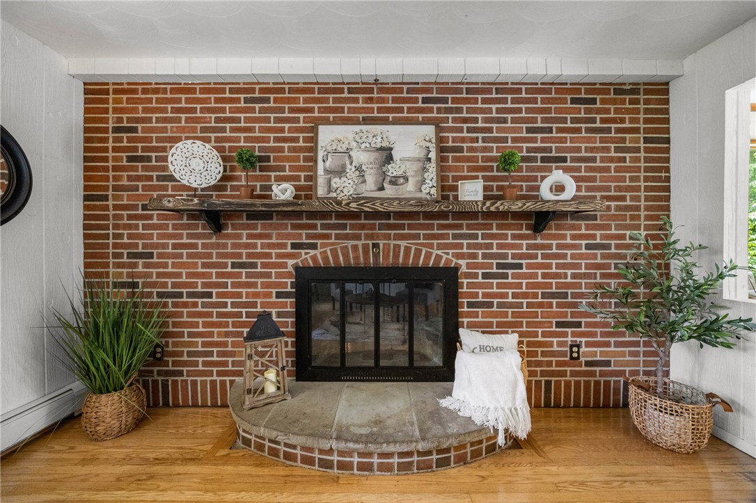 7242 Jackson Hill Road Arcadia, NY 14513 - Photo 6 of 39 Brick Accent Wall w/ Wood Burning Fireplace