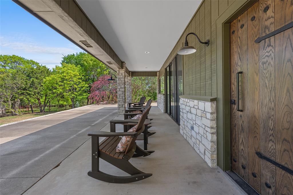 201 Jenkins Ridge Aledo, TX 76008 - Photo 27 of 39 a view of a porch with chairs and backyard