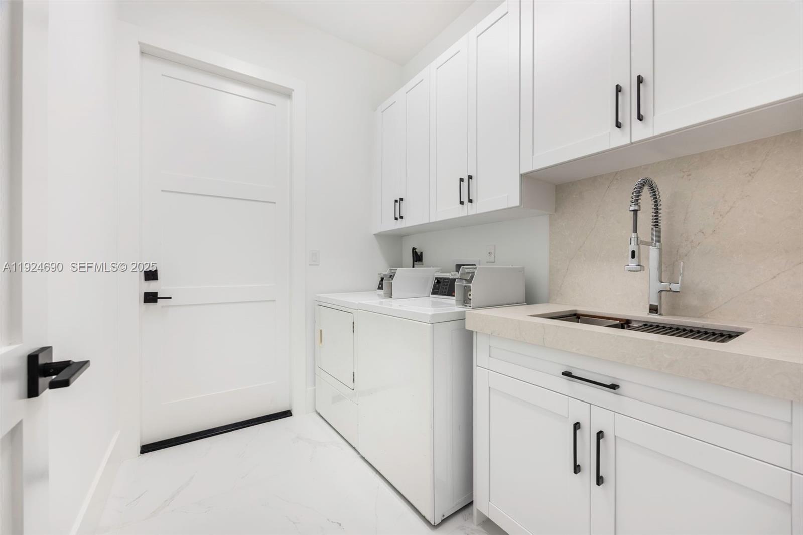 6845 Southwest 52nd Street Miami, FL 33155 - Photo 26 of 39 a view of a kitchen with cabinets