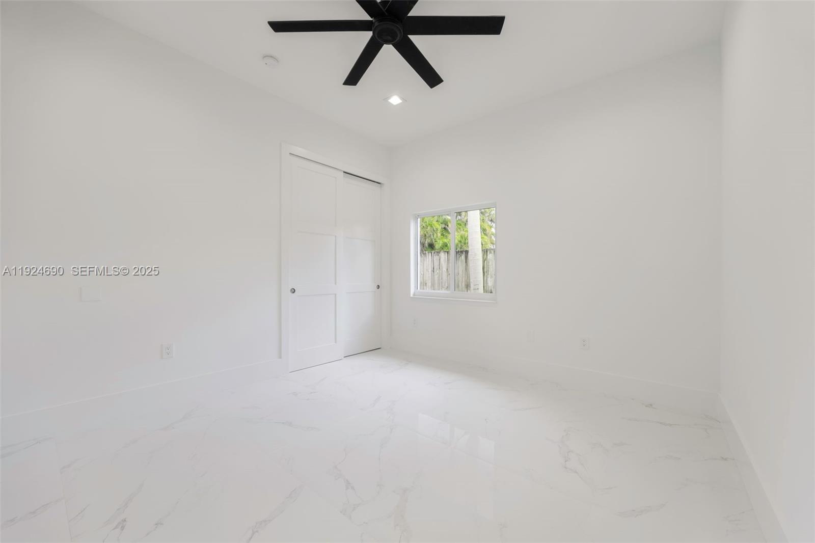 6845 Southwest 52nd Street Miami, FL 33155 - Photo 27 of 39 a view of an empty room and a window