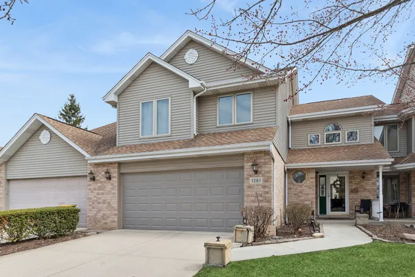 front view of a house with yard