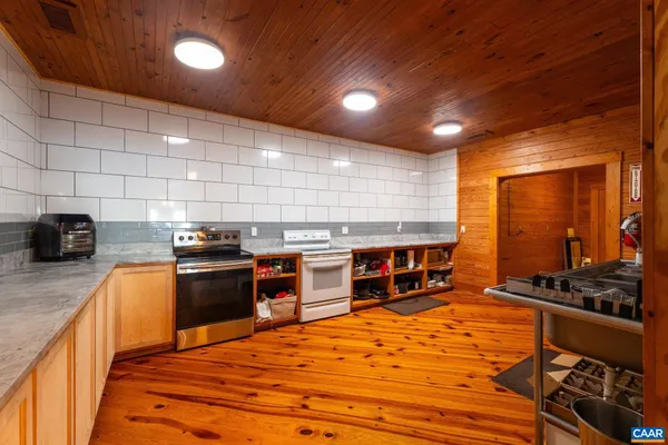 a view of chairs and table in the patio