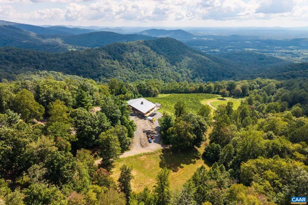 a view of balcony with furniture