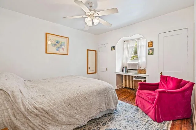 a bed room with a bed and a couch