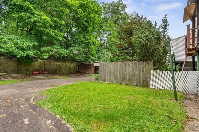 a view of a backyard with a garden