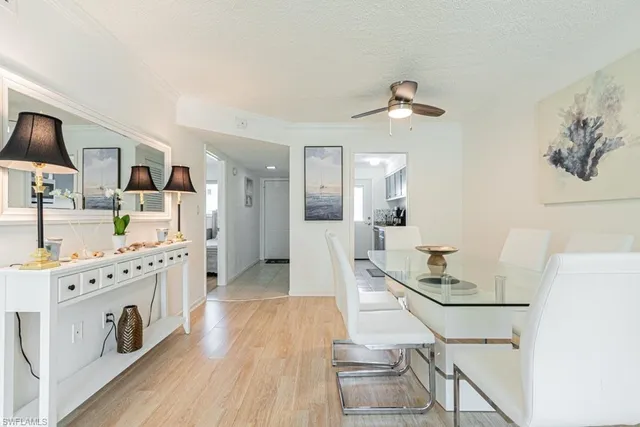 a kitchen with sink and stove top oven