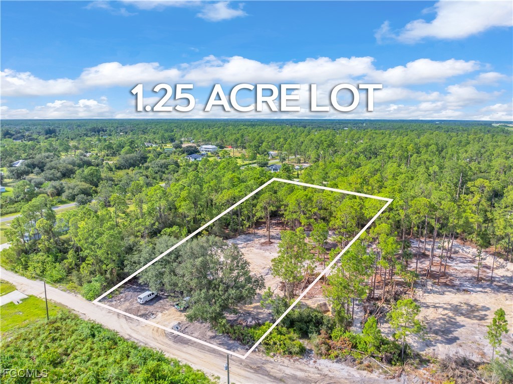 7602 18th Place LaBelle, FL 33935 - Photo 2 of 30 a sign that is on a street sign