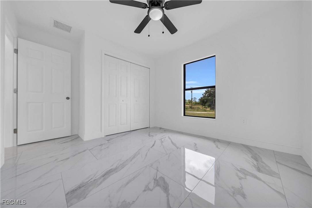 7602 18th Place LaBelle, FL 33935 - Photo 21 of 30 a view of an empty room and window