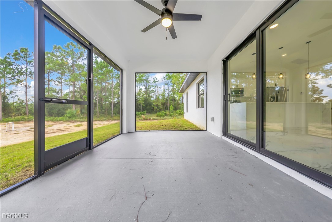 7602 18th Place LaBelle, FL 33935 - Photo 24 of 30 a view of an entryway with floor to ceiling windows